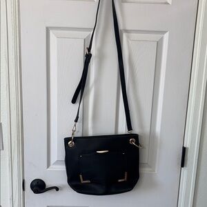Chic Black Crossbody Bag with Gold Accents